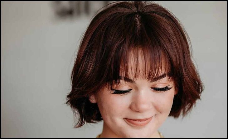 Short Layered Hairstyle with Wispy Bangs